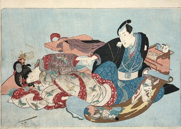 Couple watching erotic scroll by Utagawa Kunisada