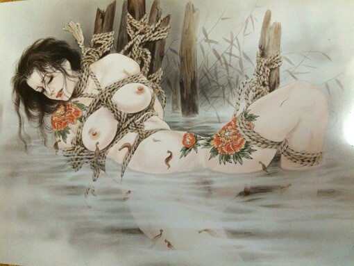 Tied girl lying in the water by ozuma kaname