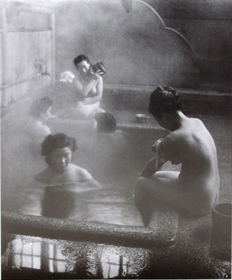 Black and white photograph of Japanese women bathing.