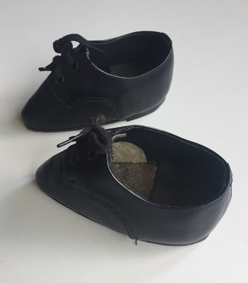 Rare pair of leather lotus shoes