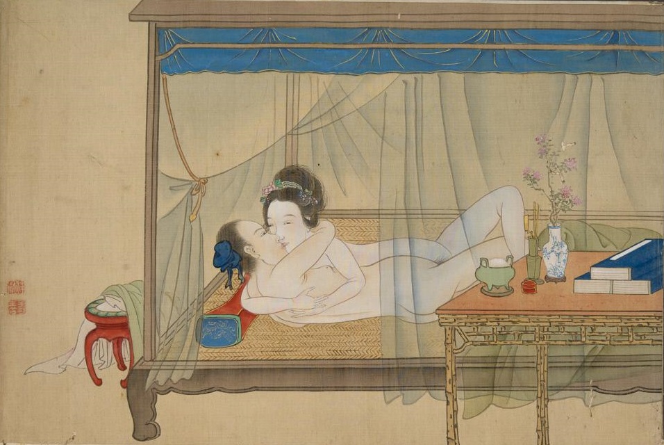 Japanese couple making love underneath a mosquito-net