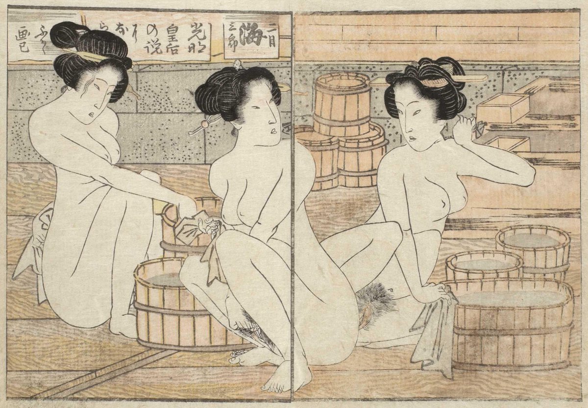 Three nude Japanese women in the bathhouse.